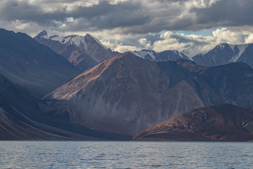 Pangong Tso with reddish-brown mountains, Ladakh