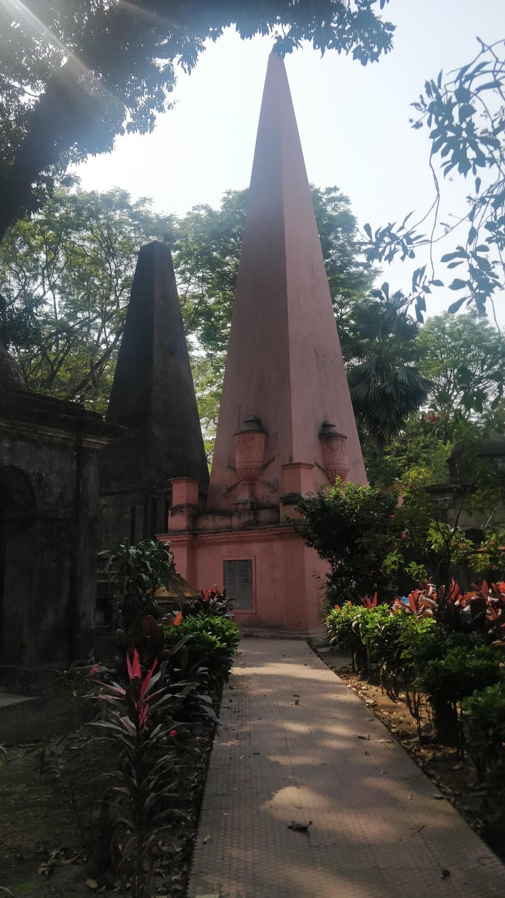 The terracotta obelisks — Egyptian revival, transplanted to Bengal